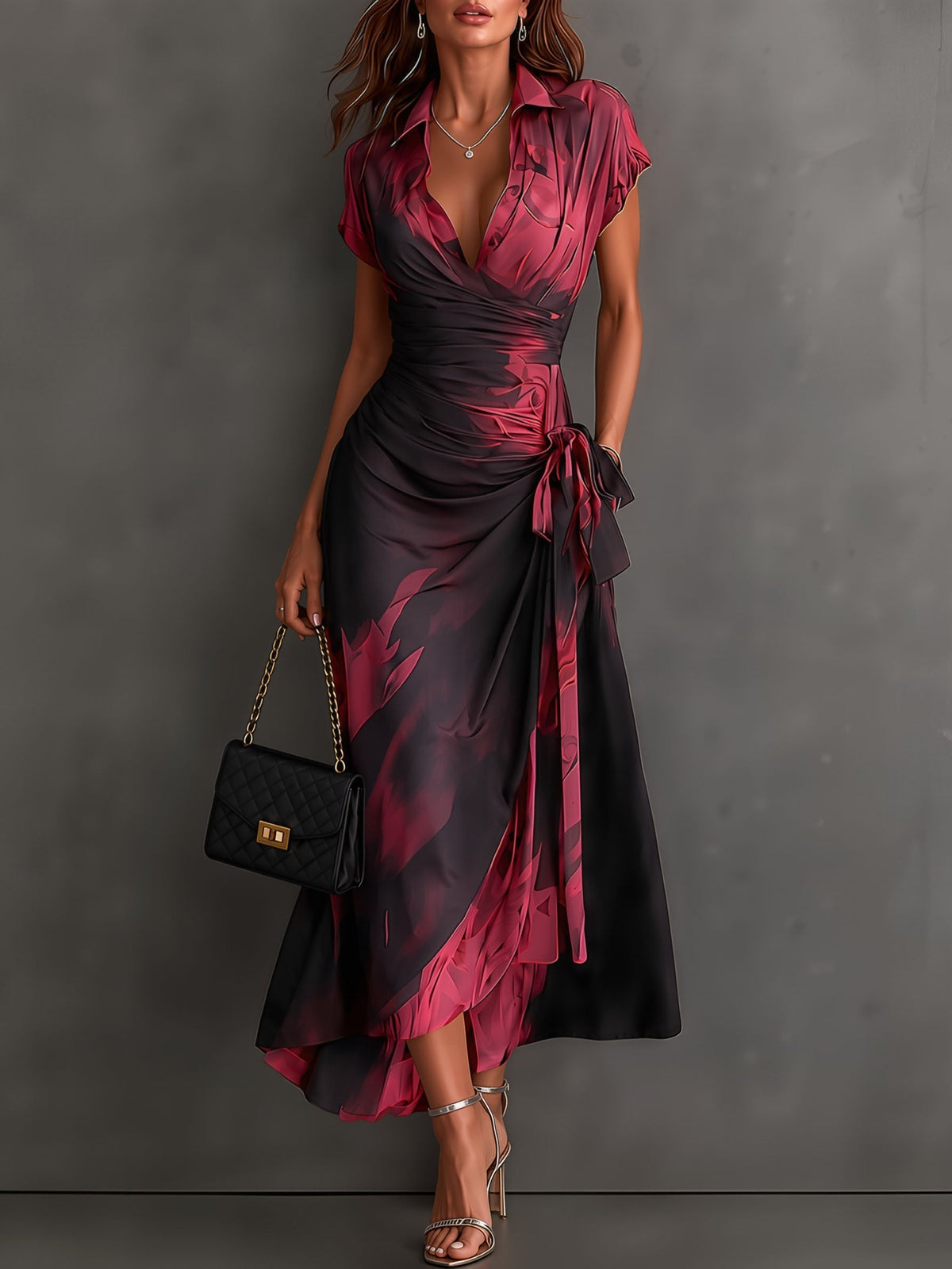VESTIDO  CRUZADO CON ESTAMPADO ABSTRACTO ROJO Y NEGRO, CUELLO CAMISERO CON ESCOTE EN V, MANGA CORTA, CINTURA ANUDADA Y BAJO ASIMÉTRICO CON VOLANTE